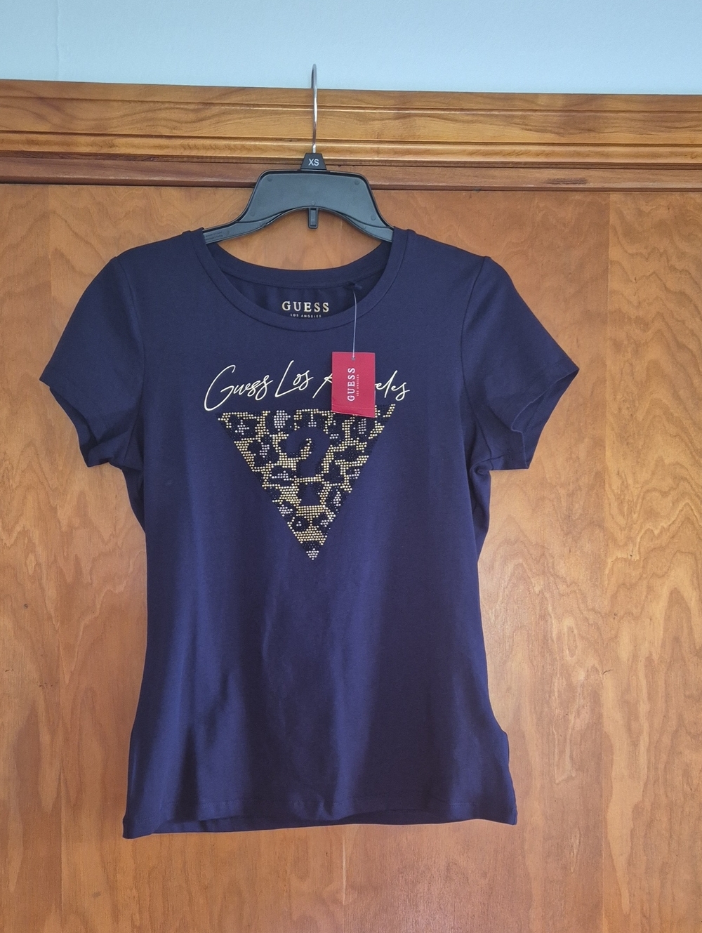 GUESS Navy Tee with Gold Rhinestone Triangle Logo